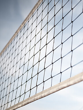 Volleyball net separating siides