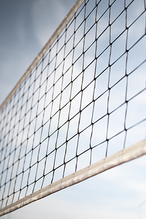 Volleyball net separating siides